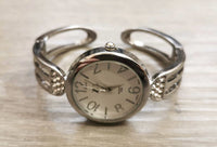 Montre bangle femme ronde argent