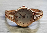 Montre bangle ronde or rose