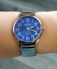 Montre bracelet extensible fond bleu