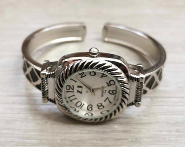 Montre bangle femme argent et noir