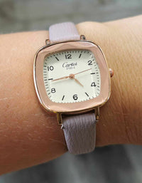 Montre femme avec bracelet de cuir mauve