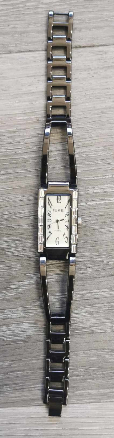 Montre pour femmes rectangle métal noir