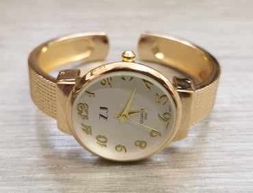 Montre bangle femme ronde or