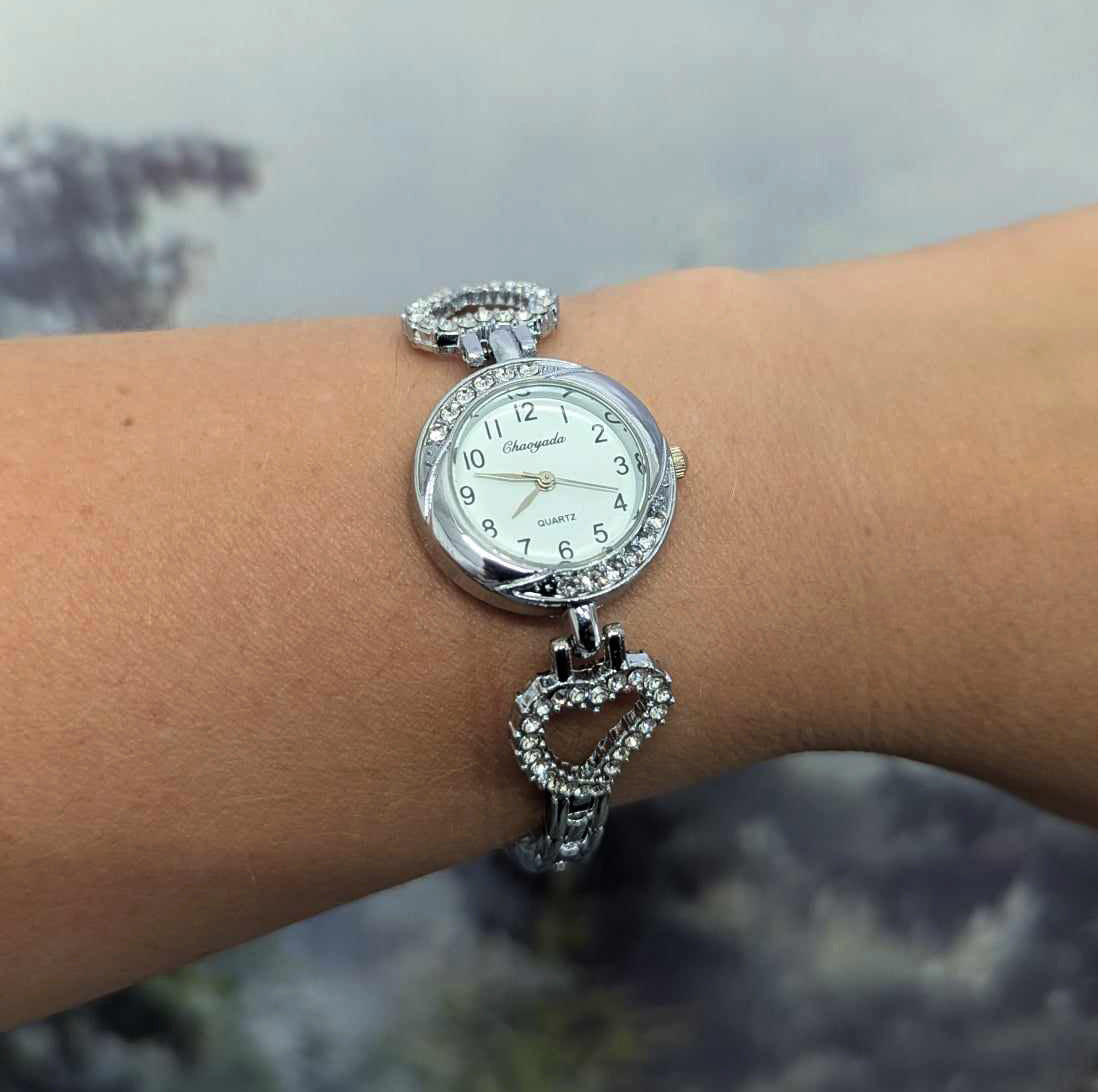 Montre femme bracelet coeurs argents