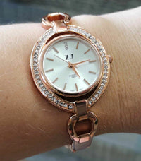 Montre bangle femmes or rose